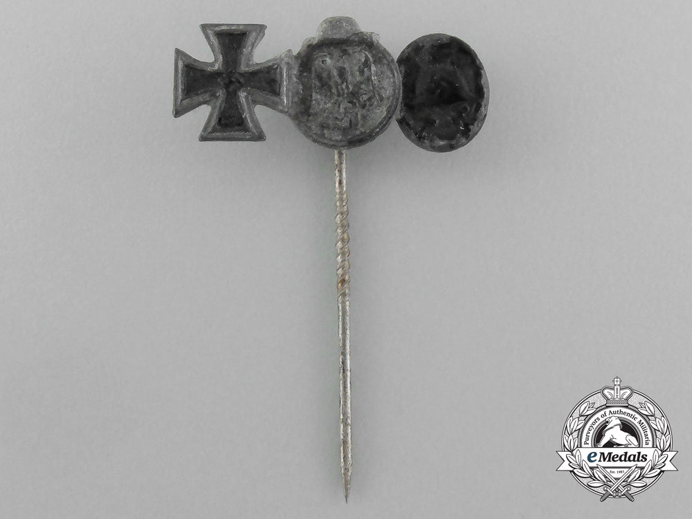 a_second_war_german_miniature_iron_cross_stickpin_grouping_on_its_ldo_salesman’s_board_e_4442