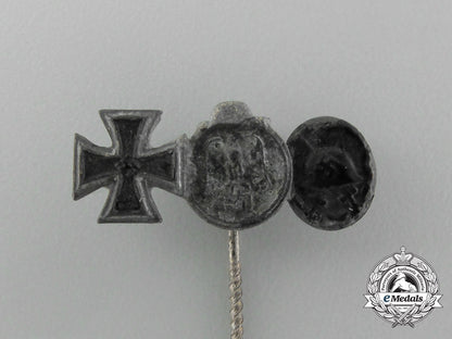 a_second_war_german_miniature_iron_cross_stickpin_grouping_on_its_ldo_salesman’s_board_e_4443
