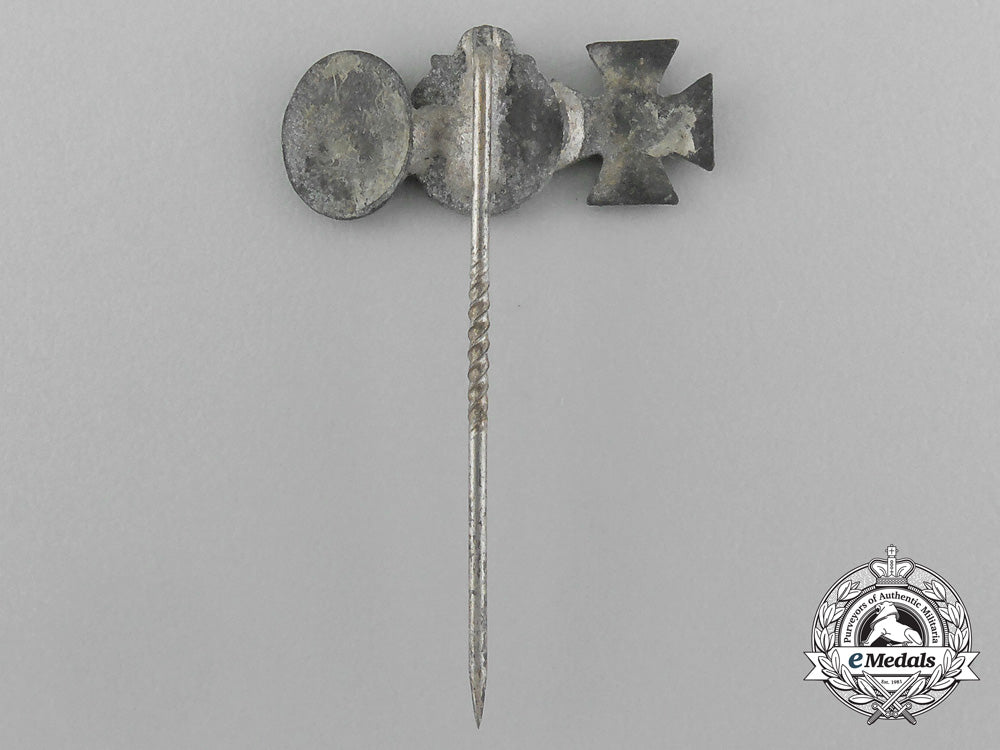 a_second_war_german_miniature_iron_cross_stickpin_grouping_on_its_ldo_salesman’s_board_e_4445