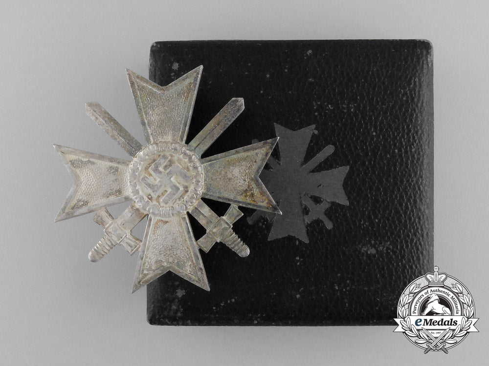 a_war_merit_cross_first_class_with_swords_by_deschler&_sohn_in_its_original_case_of_issue_e_4447
