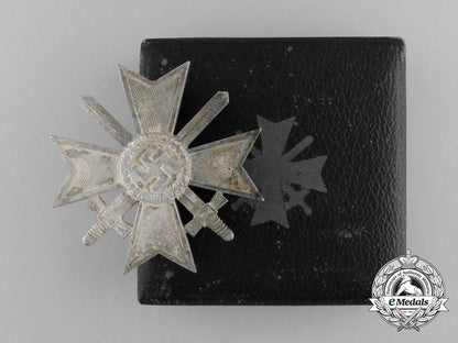 a_war_merit_cross_first_class_with_swords_by_deschler&_sohn_in_its_original_case_of_issue_e_4447