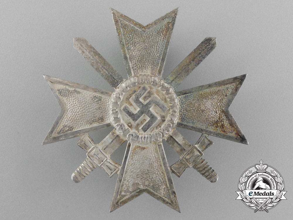 a_war_merit_cross_first_class_with_swords_by_deschler&_sohn_in_its_original_case_of_issue_e_4450