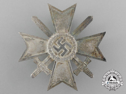 a_war_merit_cross_first_class_with_swords_by_deschler&_sohn_in_its_original_case_of_issue_e_4450