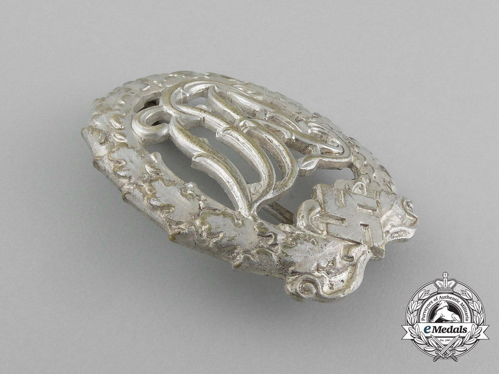 a_silver_grade_drl_sports_badge_by_wernstein_of_jena_e_4571