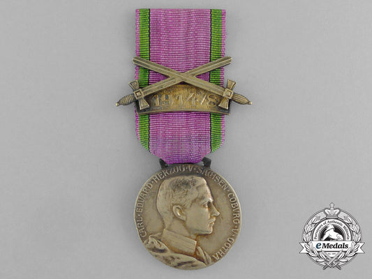 a_saxe-_ernestine_house_order_merit_medal;_gold_grade_with1914/8_and_swords_clasp_e_5039