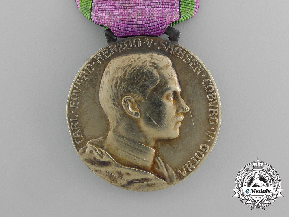 a_saxe-_ernestine_house_order_merit_medal;_gold_grade_with1914/8_and_swords_clasp_e_5040