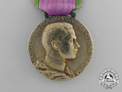 a_saxe-_ernestine_house_order_merit_medal;_gold_grade_with1914/8_and_swords_clasp_e_5040