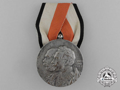 a1914_germany&_austria_victorious_fighting_in_the_east_and_west_medal_e_5058