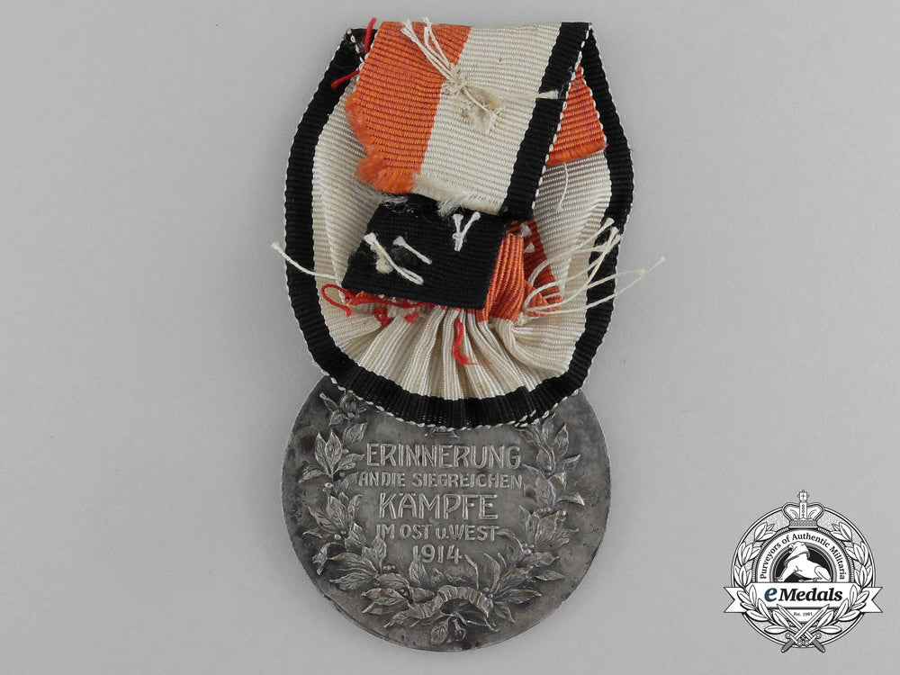 a1914_germany&_austria_victorious_fighting_in_the_east_and_west_medal_e_5061