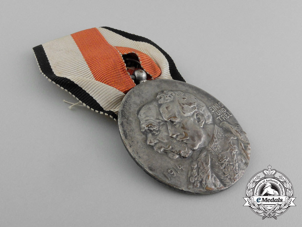 a1914_germany&_austria_victorious_fighting_in_the_east_and_west_medal_e_5062