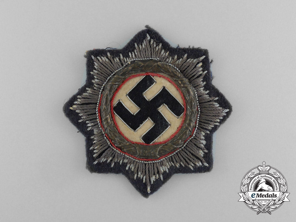 germany,_luftwaffe._a_uniform_removed_german_cross_in_gold,_by_c._e._juncker_e_5073_2_1