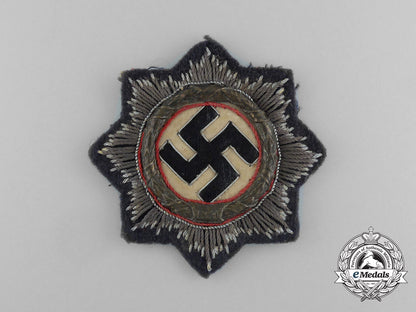 germany,_luftwaffe._a_uniform_removed_german_cross_in_gold,_by_c._e._juncker_e_5073_2_1