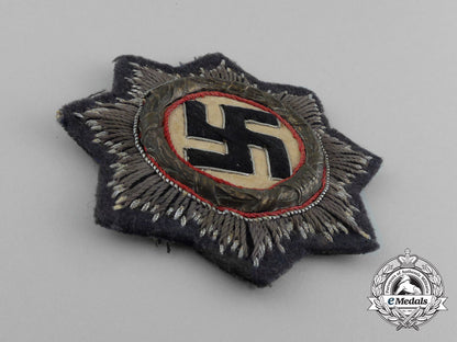 germany,_luftwaffe._a_uniform_removed_german_cross_in_gold,_by_c._e._juncker_e_5075_2_1