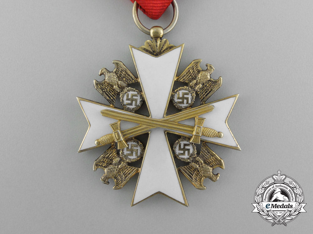 germany,_third_reich._a_german_eagle_order_with_swords,_v_class,_by_godet&_co._e_5499_1