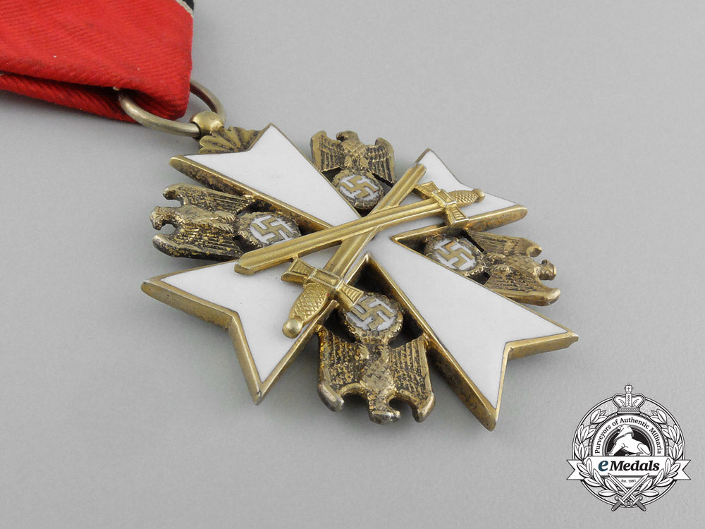 germany,_third_reich._a_german_eagle_order_with_swords,_v_class,_by_godet&_co._e_5504_1