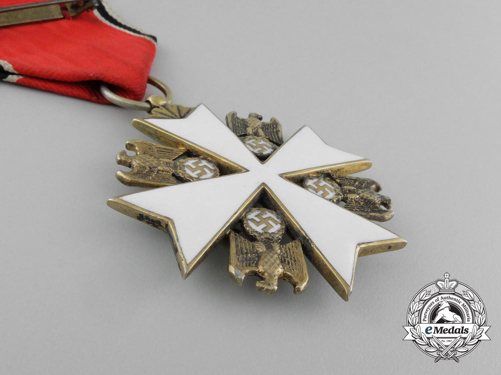 germany,_third_reich._a_german_eagle_order_with_swords,_v_class,_by_godet&_co._e_5505_1