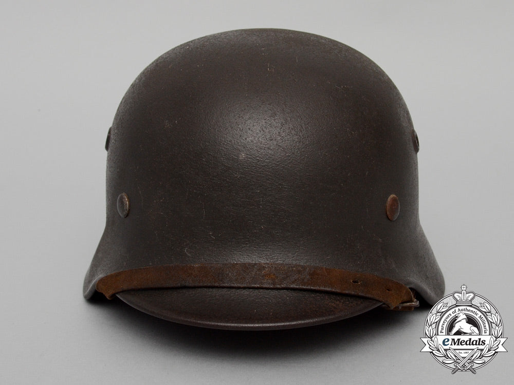 an_m40_wehrmacht_heer(_army)_stahlhelm_with_field_made_splinter_cover_by_quist_of_esslingen_e_5516