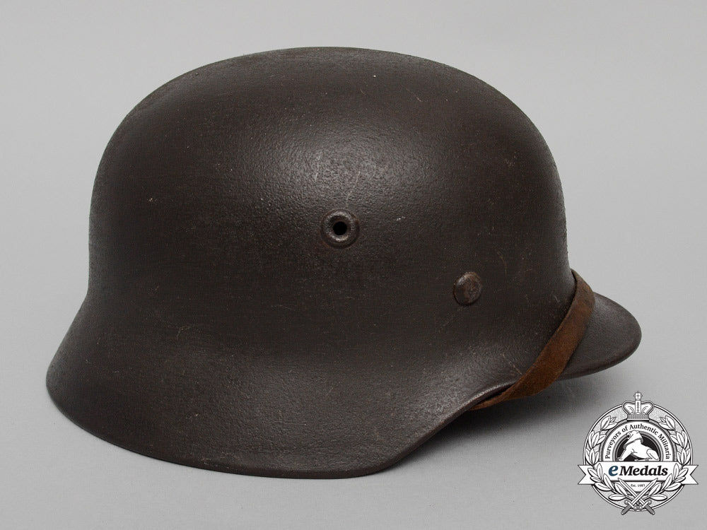 an_m40_wehrmacht_heer(_army)_stahlhelm_with_field_made_splinter_cover_by_quist_of_esslingen_e_5517