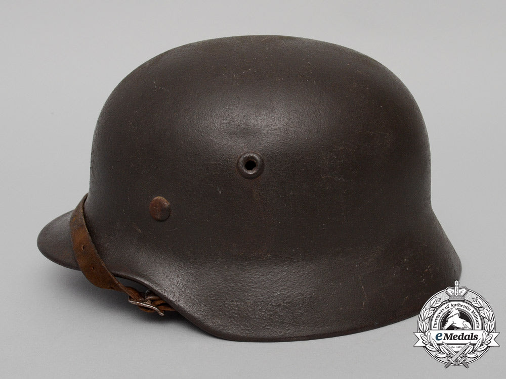 an_m40_wehrmacht_heer(_army)_stahlhelm_with_field_made_splinter_cover_by_quist_of_esslingen_e_5519