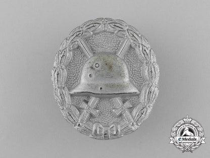 three_first_war_german_imperial_wound_badges_e_5760