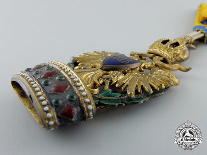 an_austrian_order_of_the_iron_crown;_third_class_with_war_decoration_by_a.e.kochert_e_585