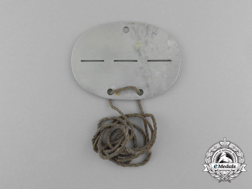 a_second_war_german_id_tag_to_schwerin_rad_gruppe_e_5853
