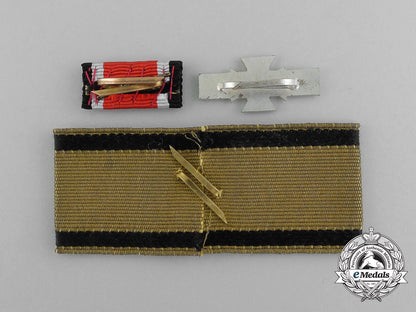 a_grouping_of_three_post-_war1957_versions_of_second_war_german_awards_e_5867