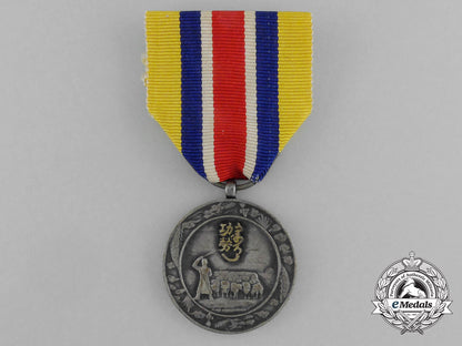 a_inner_mongolian_national_foundation_merit_medal1939_e_5907_1