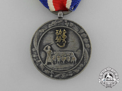 a_inner_mongolian_national_foundation_merit_medal1939_e_5908_1