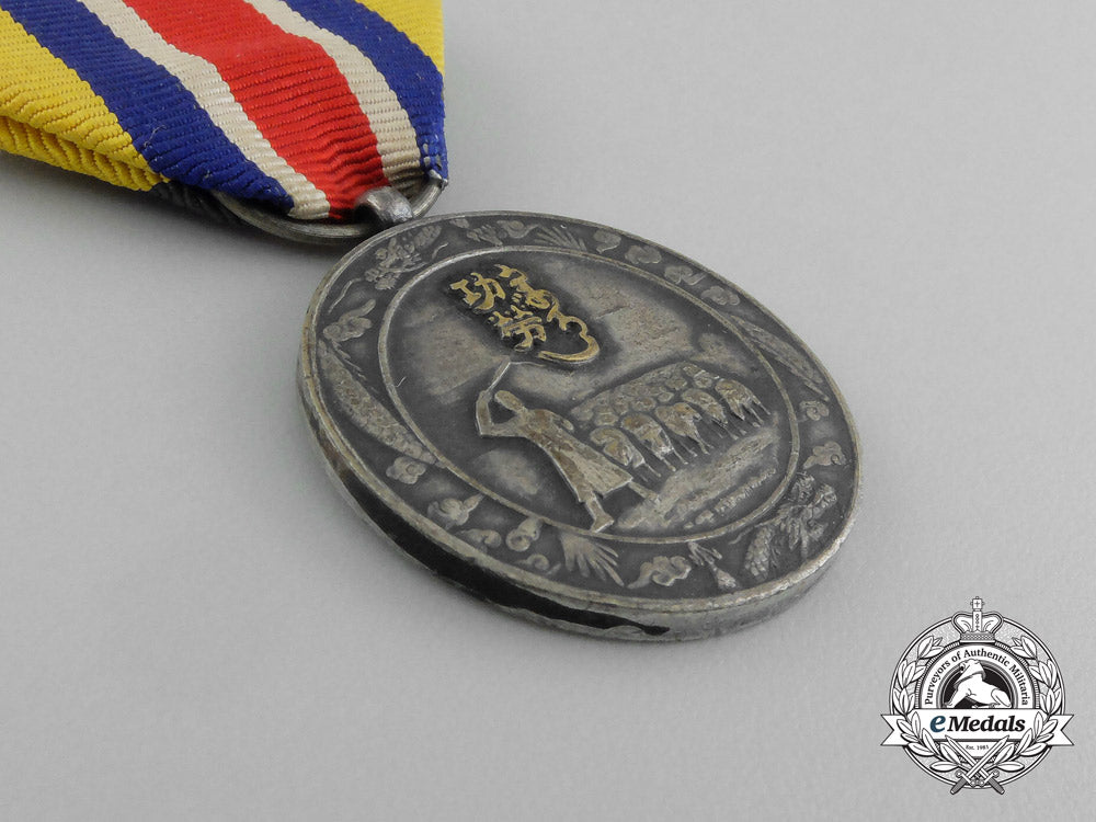 a_inner_mongolian_national_foundation_merit_medal1939_e_5911_1