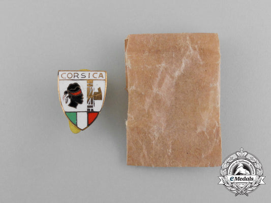 italy,_corsica._a_fascist_party_badge_with_packet_of_issue_e_5982_1
