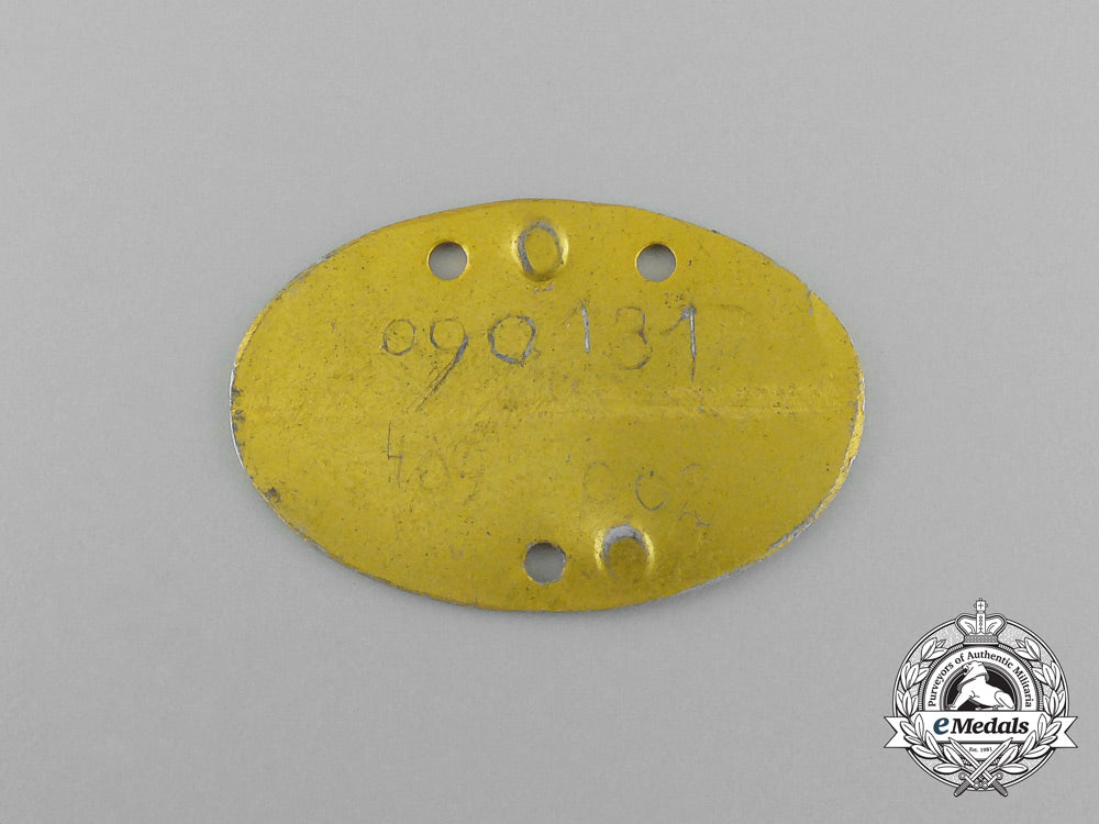a_kriegsmarine_identification_tag_named_to_coastal_artillery_officer_fritz_mayer_e_6024