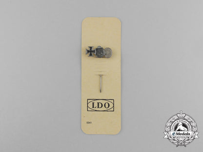 a_second_war_german_miniature_iron_cross_stick_pin_grouping_on_its_ldo_salesman’s_board_e_6031
