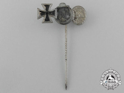 a_second_war_german_miniature_iron_cross_stick_pin_grouping_on_its_ldo_salesman’s_board_e_6032