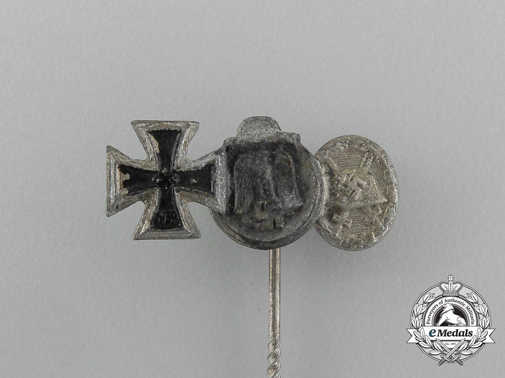 a_second_war_german_miniature_iron_cross_stick_pin_grouping_on_its_ldo_salesman’s_board_e_6033