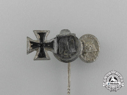 a_second_war_german_miniature_iron_cross_stick_pin_grouping_on_its_ldo_salesman’s_board_e_6033