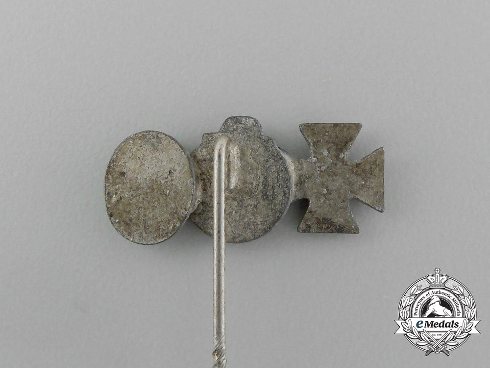 a_second_war_german_miniature_iron_cross_stick_pin_grouping_on_its_ldo_salesman’s_board_e_6034