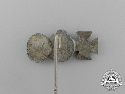 a_second_war_german_miniature_iron_cross_stick_pin_grouping_on_its_ldo_salesman’s_board_e_6034