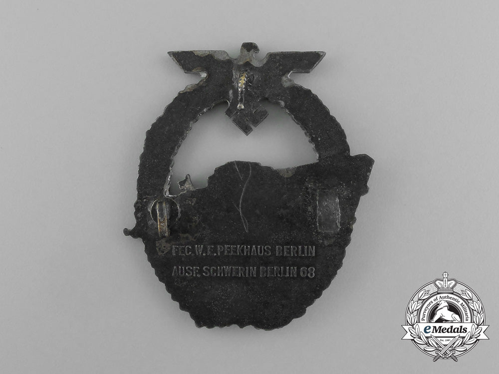 a_kriegsmarine_e-_boat_badge_by_schwerin&_sohn_of_berlin;2_nd_type;1_st_variety_e_6162
