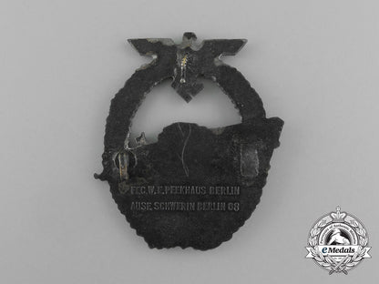 a_kriegsmarine_e-_boat_badge_by_schwerin&_sohn_of_berlin;2_nd_type;1_st_variety_e_6162