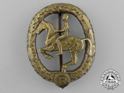 a_mint_second_war_german_bronze_grade_equestrian_badge_and_stick_pin_on_its_display_board_e_6272