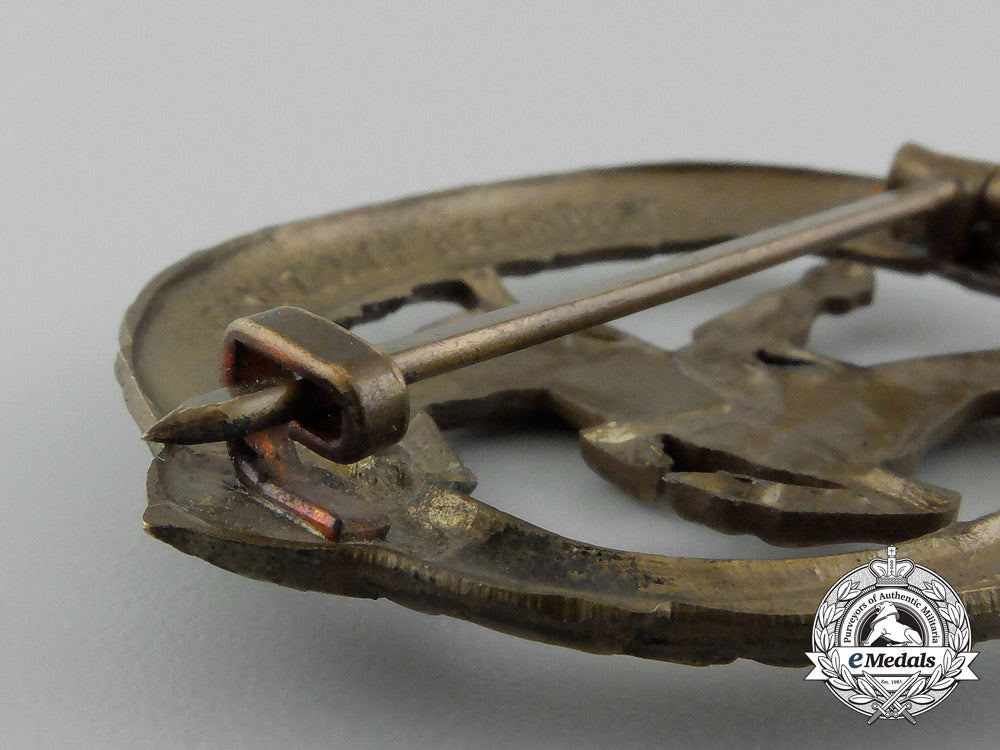 a_mint_second_war_german_bronze_grade_equestrian_badge_and_stick_pin_on_its_display_board_e_6276