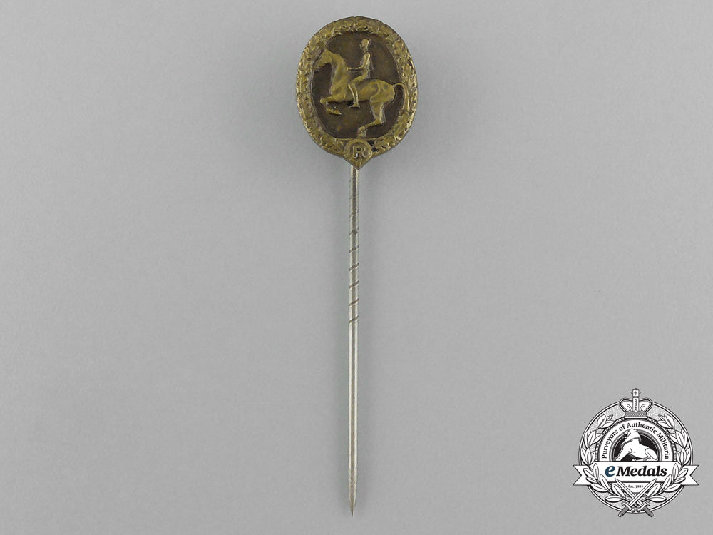 a_mint_second_war_german_bronze_grade_equestrian_badge_and_stick_pin_on_its_display_board_e_6278