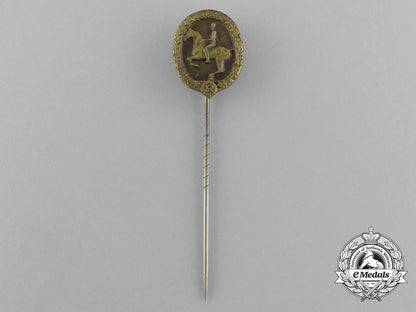 a_mint_second_war_german_bronze_grade_equestrian_badge_and_stick_pin_on_its_display_board_e_6278