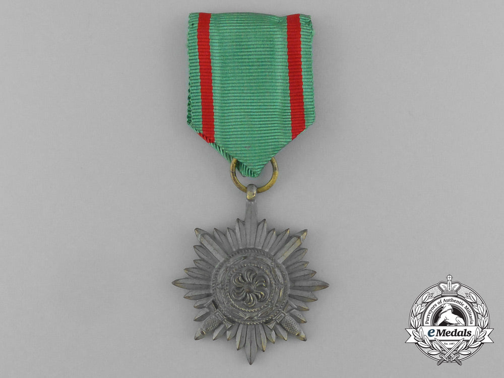 a_gold_grade_eastern_people_bravery_decoration;2_nd_class_by_r._wächtler&_lange_in_its_packet_of_issue_e_6300