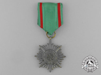 a_gold_grade_eastern_people_bravery_decoration;2_nd_class_by_r._wächtler&_lange_in_its_packet_of_issue_e_6300