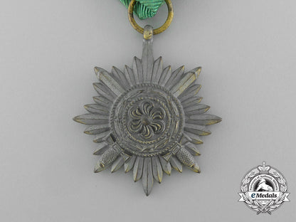 a_gold_grade_eastern_people_bravery_decoration;2_nd_class_by_r._wächtler&_lange_in_its_packet_of_issue_e_6301