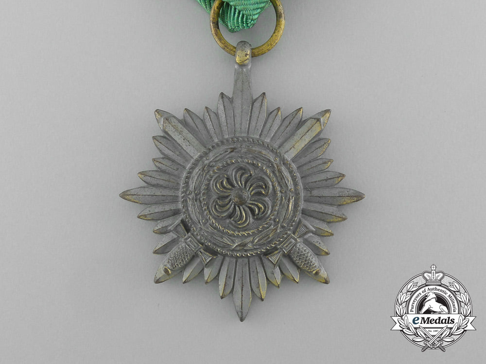 a_gold_grade_eastern_people_bravery_decoration;2_nd_class_by_r._wächtler&_lange_in_its_packet_of_issue_e_6301