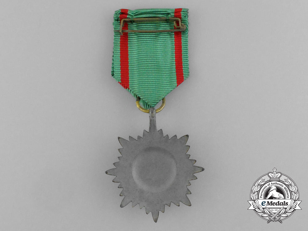 a_gold_grade_eastern_people_bravery_decoration;2_nd_class_by_r._wächtler&_lange_in_its_packet_of_issue_e_6302
