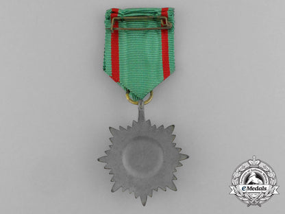 a_gold_grade_eastern_people_bravery_decoration;2_nd_class_by_r._wächtler&_lange_in_its_packet_of_issue_e_6302